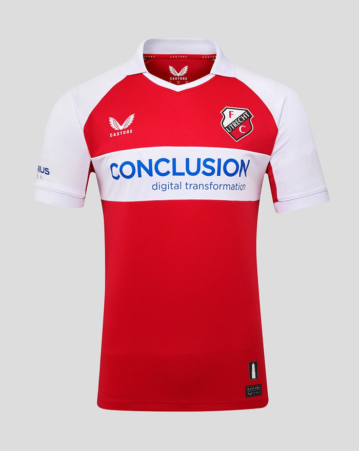 Front view of red FC Utrecht fourth shirt with white chest band, crest on the left chest and blue CONCLUSION sponsor across the front.