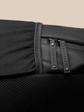 Close up of midnight blue Core Backpack fabric and zipper with stitching detail
