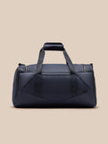 Midnight navy Core Holdall with padded handles and adjustable shoulder strap viewed from a front angle
