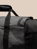 Close up of the Core Holdall shoulder strap attached to the bag