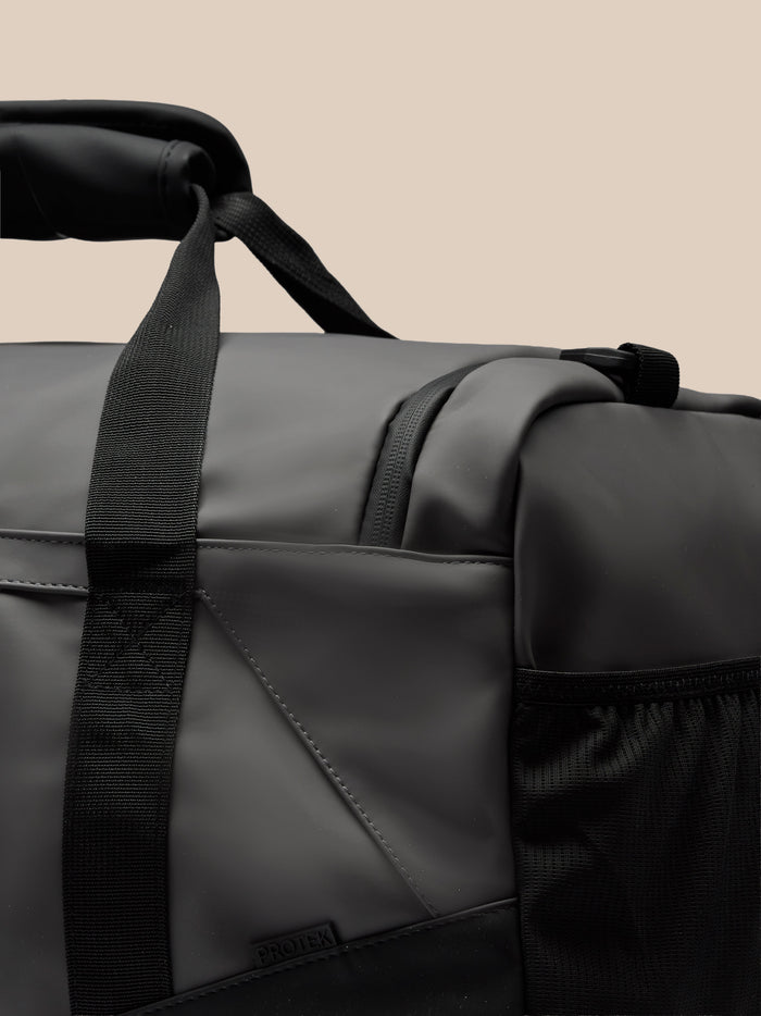 Close up of the Core Holdall shoulder strap attached to the bag