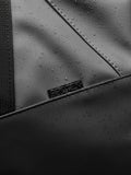 Close up of ProTek water resistant surface with visible stitching on the Core Holdall