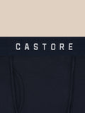 Close-up of navy boxer briefs waistband with CASTORE logo