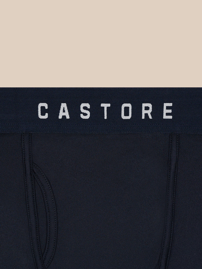 Close-up of navy boxer briefs waistband with CASTORE logo