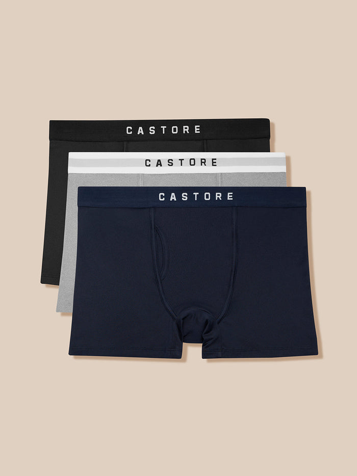 Three-pack Castore boxer briefs in black gray and navy with branded waistbands