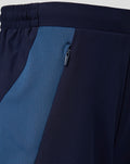 Close up of junior navy FC Utrecht Training 26/27 short showing blue side panel and zip pocket