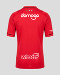 Rugzicht op FC Utrecht thuisshirt 26/27 junior in rood met Domogo bovenaan en Wissel.nl onderaan de rug