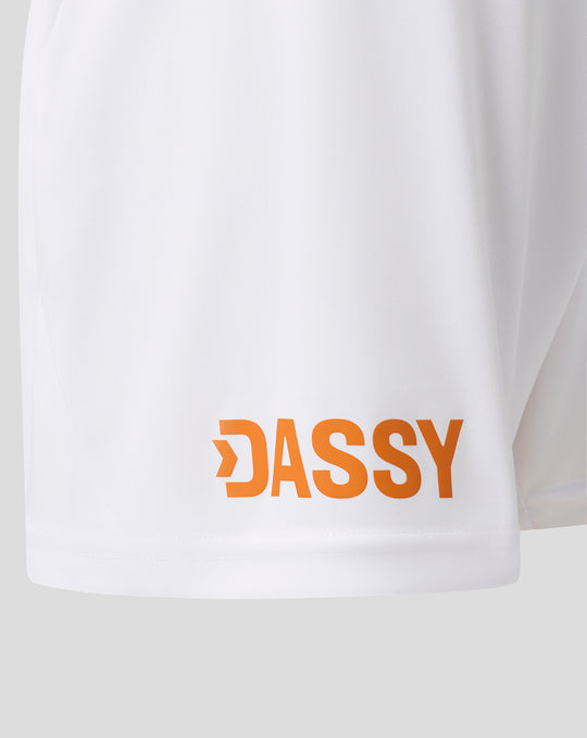 White junior shorts with orange DASSY sponsor logo near the hem