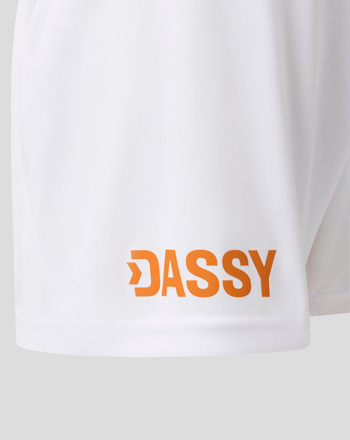White junior shorts with orange DASSY sponsor logo near the hem