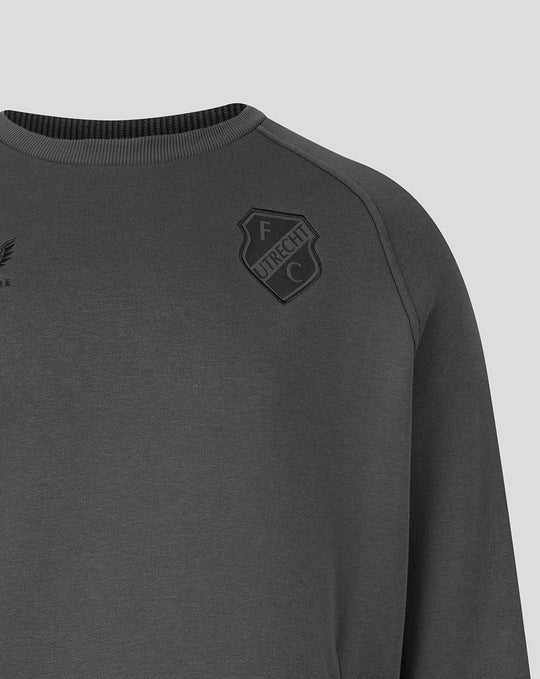 Dark grey FC Utrecht Travel fleece sweater with a subtle crest on the chest and ribbed crew neck.