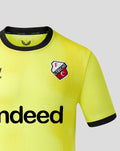 Close up of neon yellow FC Utrecht keeper shirt showing the club crest on the left chest and a portion of the Indeed sponsor.