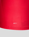 Close up of the lower hem on FC Utrecht red shirt showing AERTEK branding