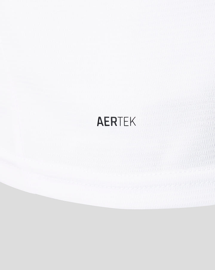 Close up of white jersey with AERTEK breathable fabric label.