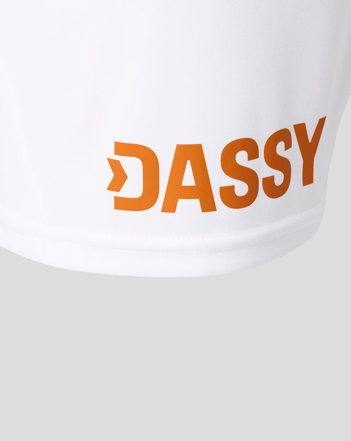 White fabric with bold orange DASSY branding along the hem near the lower edge.