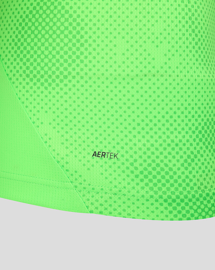 Close up of neon green FC Utrecht keeper shirt fabric with dotted texture and AERTEK logo