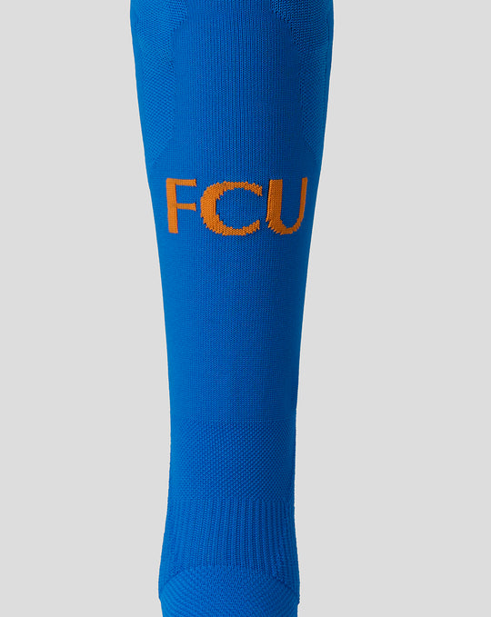Blue FC Utrecht sock with orange FCU lettering on the leg panel