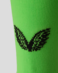 Neon groene FC Utrecht keepersok close-up met zwart vleugellogo
