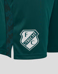 Close up of FC Utrecht shield crest on dark sea training shorts