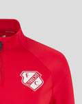 Close-up of red training top showing FC Utrecht crest on the chest and a front zipper at the collar.