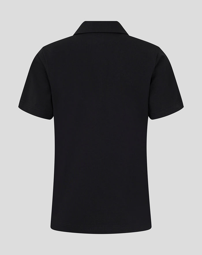 Back view of black FC Utrecht Travel Polo for women with short sleeves and a structured collar