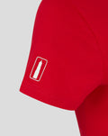Red FC Utrecht women's T shirt sleeve close up shows a small white graphic patch and neat stitching.