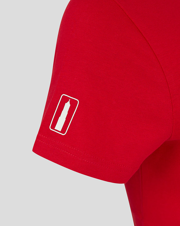 Red FC Utrecht women's T shirt sleeve close up shows a small white graphic patch and neat stitching.