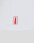 White FC Utrecht classic women's t shirt close up showing a red tower crest patch on the hem