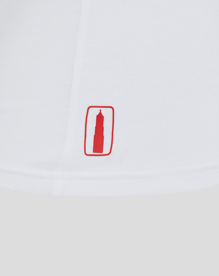 White FC Utrecht classic women's t shirt close up showing a red tower crest patch on the hem