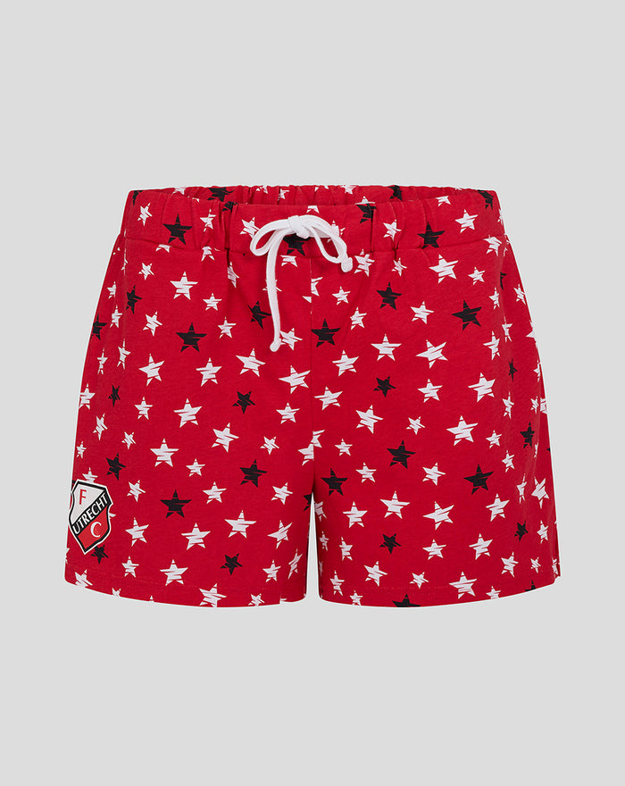 Red pajama shorts with white star pattern white drawstring and FC Utrecht patch on the left leg