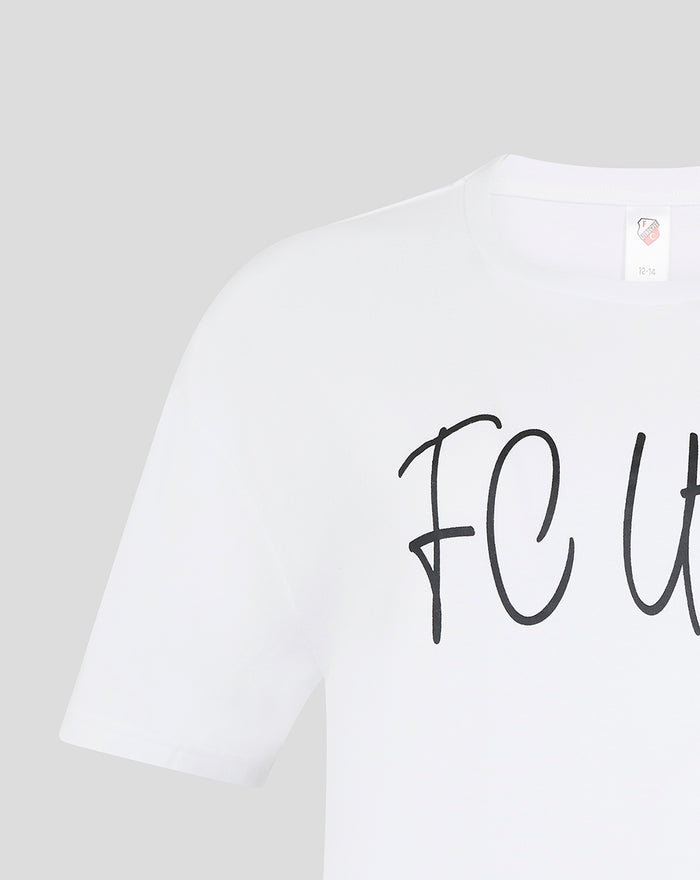 Close up of white pajama T shirt neckline with label visible