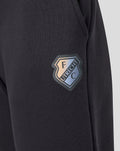 FC Utrecht shield logo on dark jogger fabric.