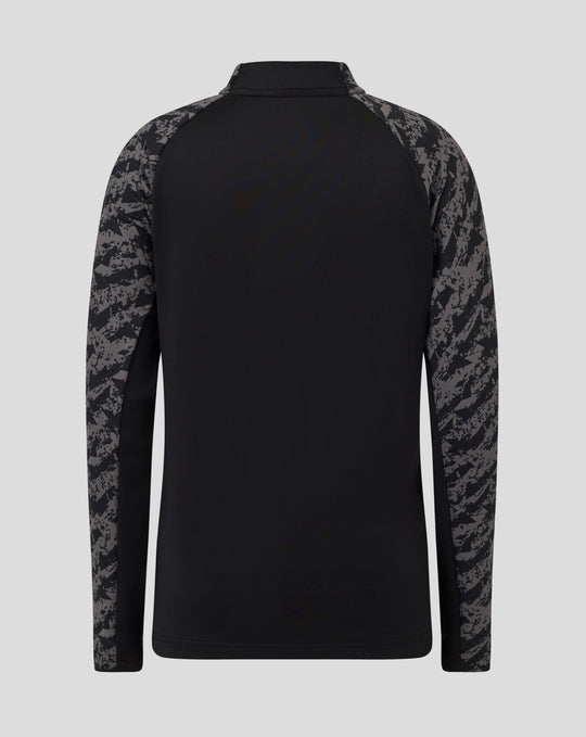 Back view of black junior FC Utrecht training midlayer top with camo sleeves and high collar.