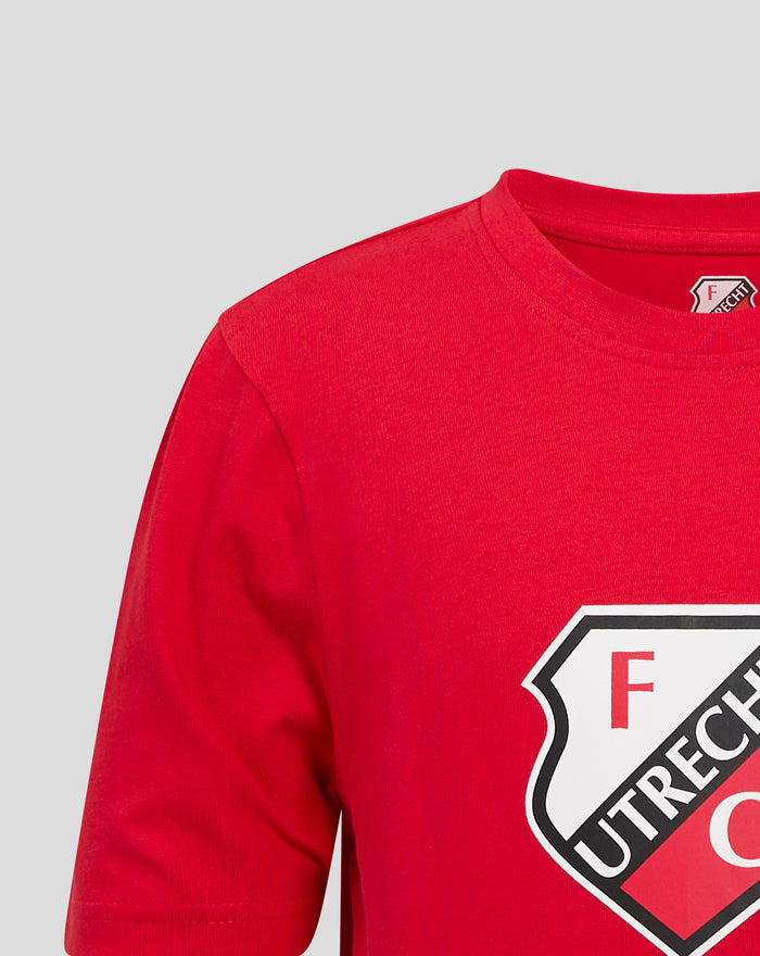 Close up of red FC Utrecht junior T-shirt neckline with partial crest at the collar.