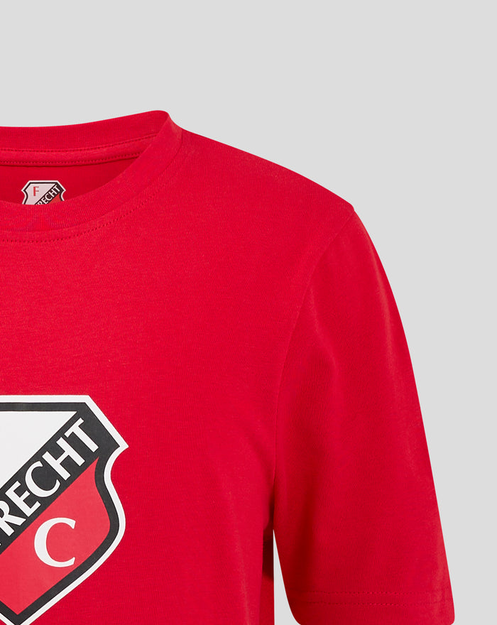 Front view of red FC Utrecht junior T-shirt with large crest graphic on the lower left.
