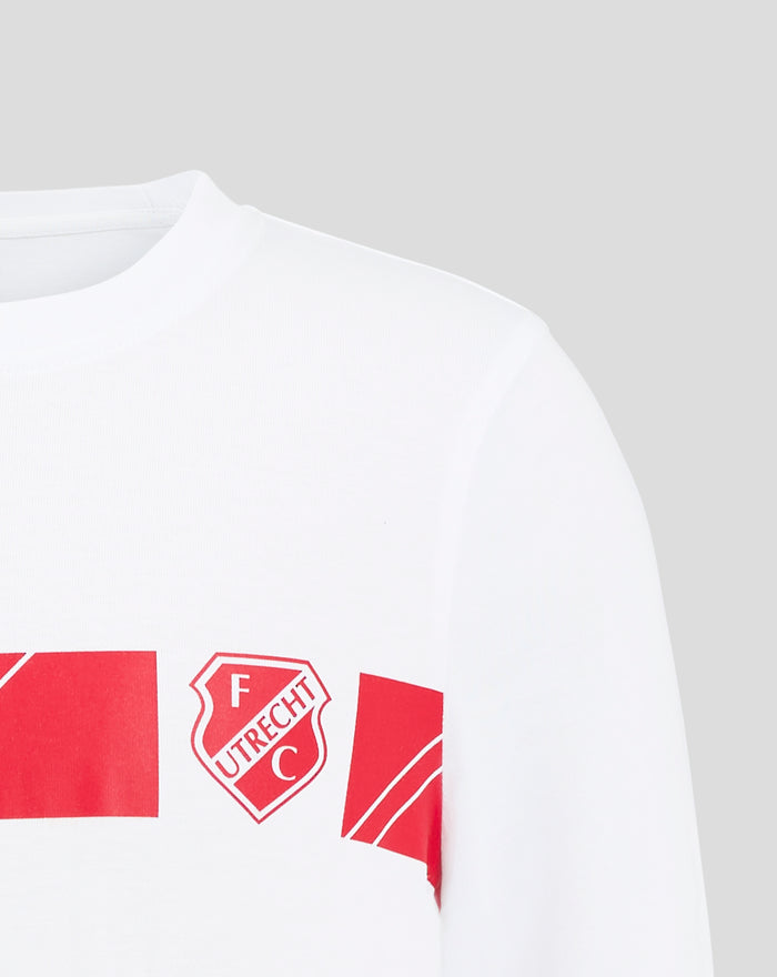 Close-up of white FC Utrecht junior cotton T shirt showing neckline and shoulder with inside neck tag and crest.