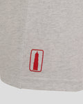 Close up of light grey fabric with red tower logo patch near the hem
