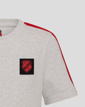 Close up of the left chest black patch with the FC Utrecht crest on a light grey junior T-shirt with red shoulder piping.