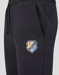 Close up of black FC Utrecht lifestyle jogging pants with crest patch on the thigh