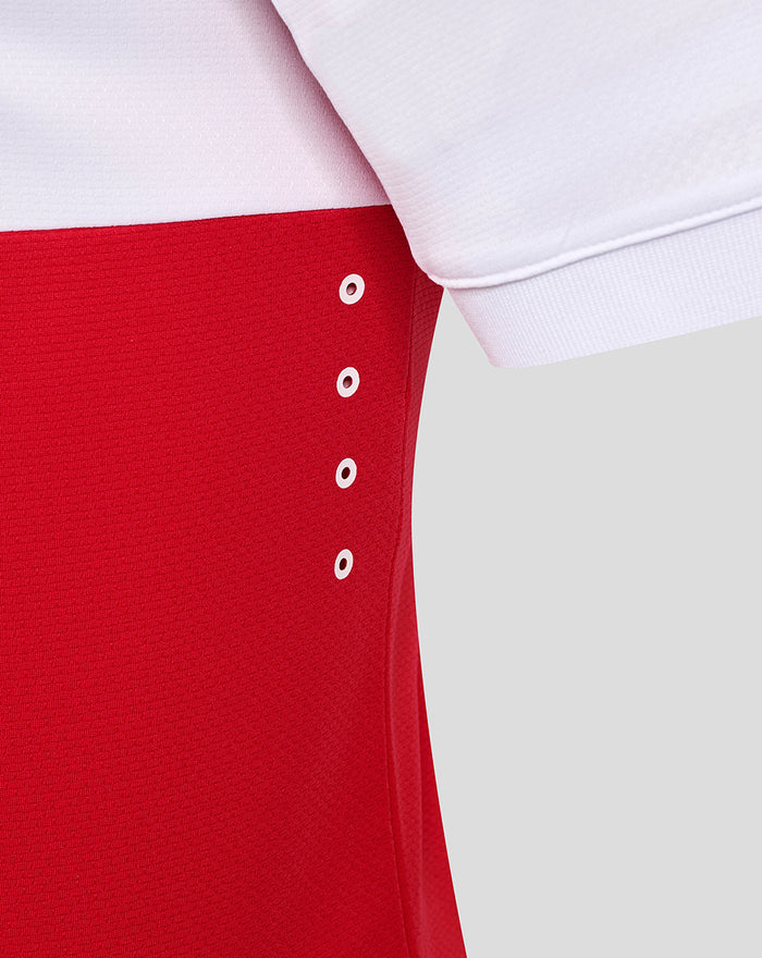 Red side panel with white eyelets beside a white sleeve cuff on the FC Utrecht fourth kit