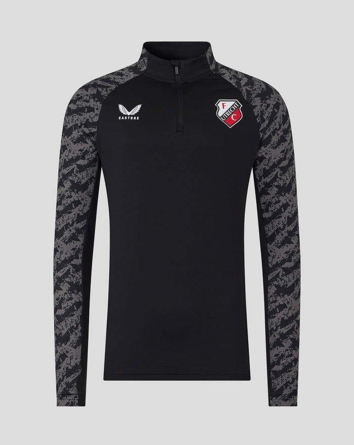 FC Utrecht training midlayer top in black with camouflage sleeves and a quarter zip, featuring the team crest on the chest