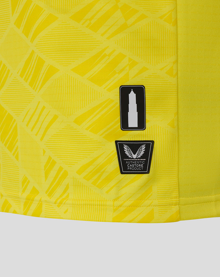 Detail of yellow FC Utrecht keeper shirt showing authentic Castore patch on the side