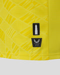 Detail of yellow FC Utrecht keeper shirt showing authentic Castore patch on the side