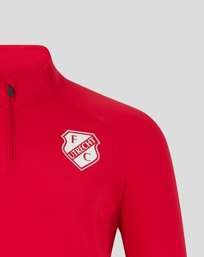 Front left chest close up of red FC Utrecht training top with zipper and crest