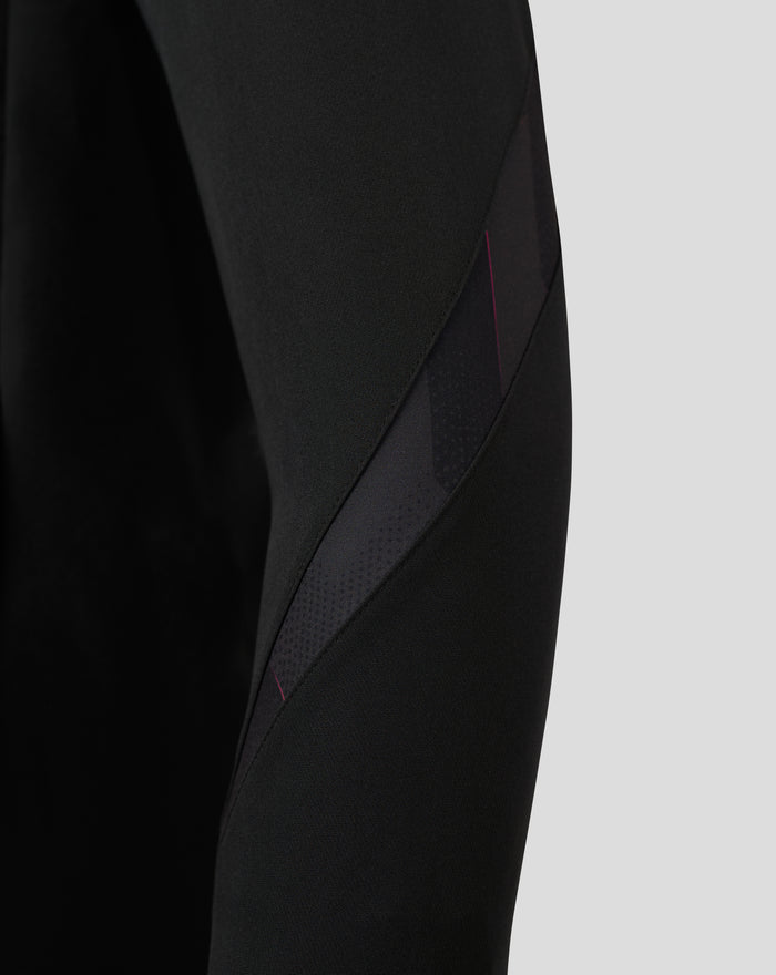 Detail of the FC Utrecht Matchday Anthem jacket with sharp angled panels and crest on the left chest
