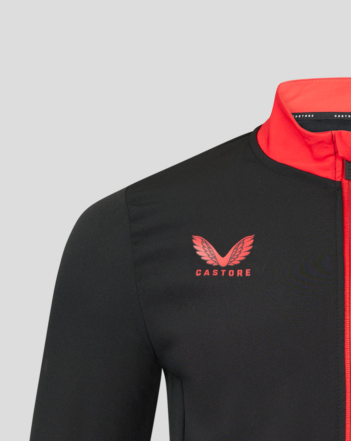 Front lower chest detail of black FC Utrecht jacket showing red wing Castore logo