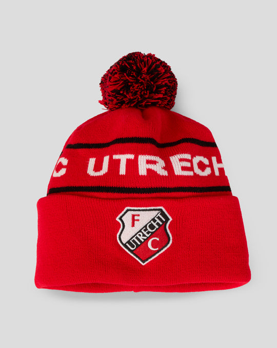 Red adults club bobble beanie with black stripes and crest, viewed from back