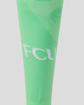Close up of bright green FC Utrecht 3rd goalkeeper sock showing knit texture and white lettering.