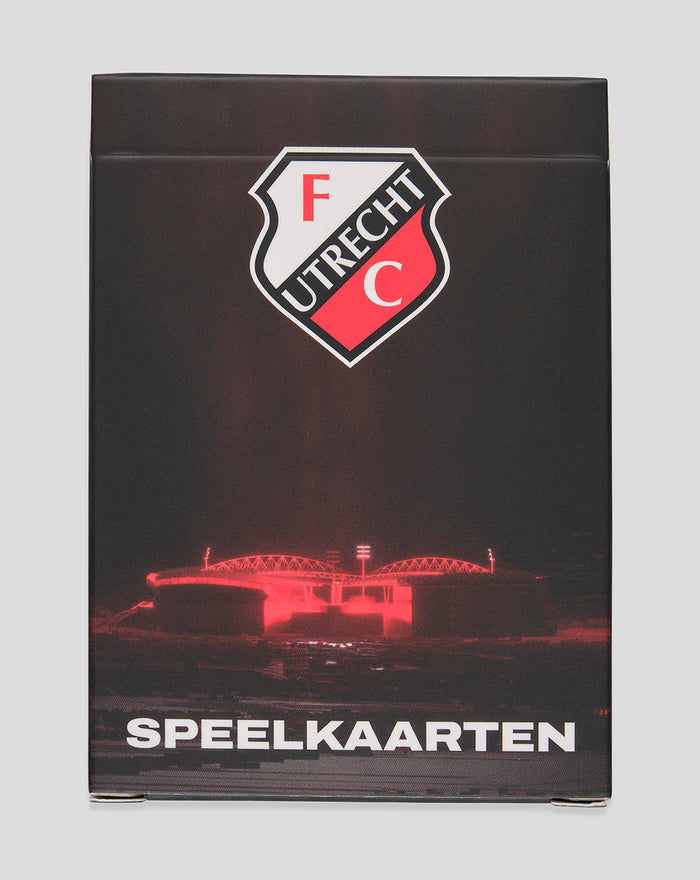 FC Utrecht Speelkaarten box with crest and red stadium glow on dark background