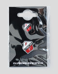 FC Utrecht club emblem badges on glossy black packaging