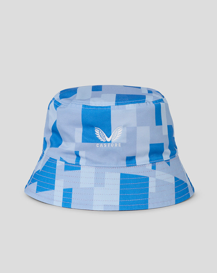 Blue geometric pixel pattern bucket hat with white Castore logo on the front.